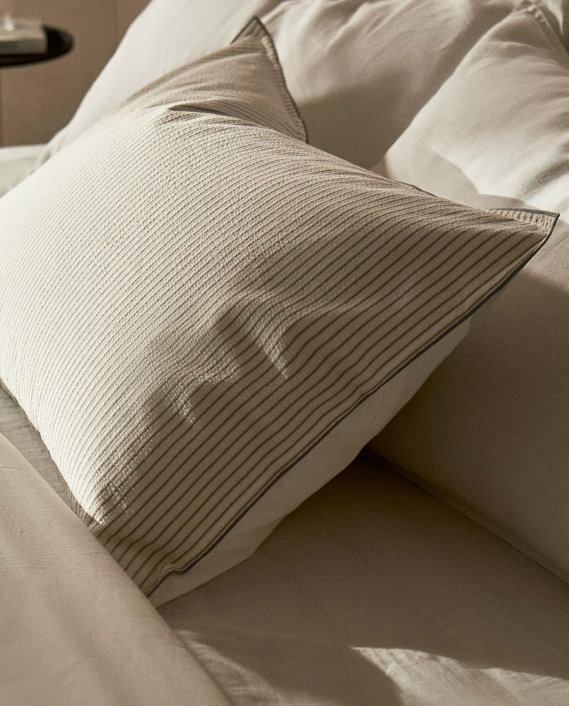 striped_seersucker_pillowcase_2-1.webp ZARA Home Striped Seersucker Pillowcase Sand Hot
